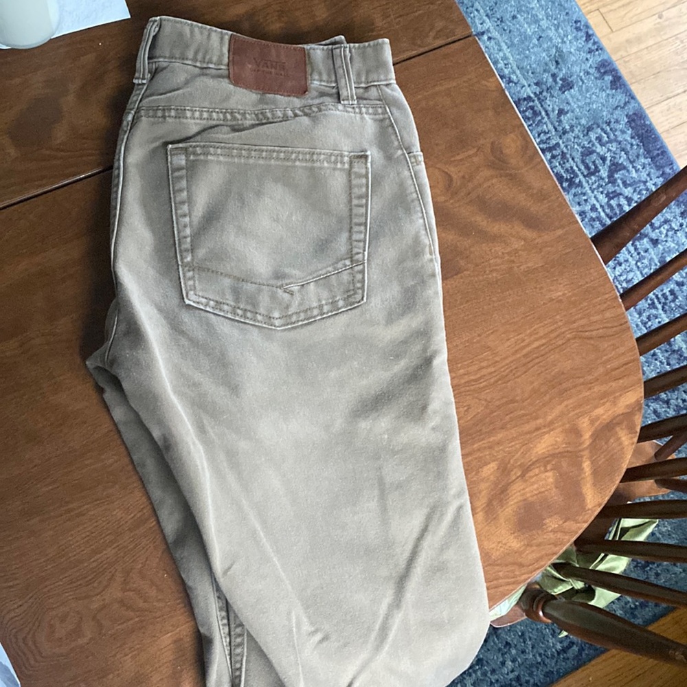 Vans size 32 regular khaki pants has a tiny hole in the right pocket